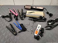 All items laid out on quilted surface