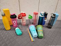 Group shot of all drinkware items arranged on surface