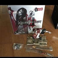 Figure, base, weapons, and box overview