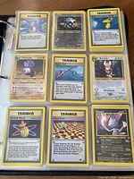 Page showing Trainer, Energy and Pokémon cards in 9-pocket sheet