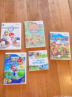 Front view of all five Wii game cases