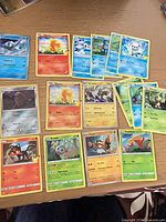 All 24 Pokémon McDonald’s promo cards laid out on tabletop