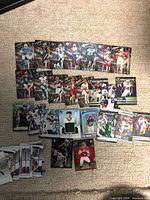 Overview of entire card lot spread on carpet