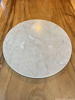 Top view of circular marble slab showing colour and veining