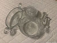 Group view of all nine cut glass pieces