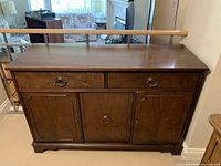 Front view of buffet showing overall design and hardware