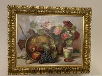 Front view of framed still life painting signed Modin