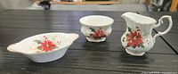 Overview of the three Royal Albert Poinsettia pieces