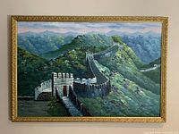 Full view of framed oil painting showing Great Wall landscape