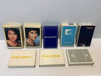 All eight airline decks and boxes displayed front view