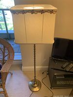 Full lamp with fabric shade attached