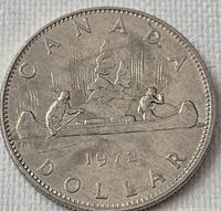 Reverse view showing Voyageur canoe design and date 1972