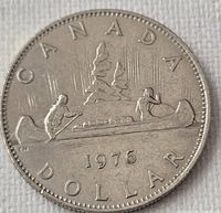 Reverse showing Voyageur canoe design and date 1976
