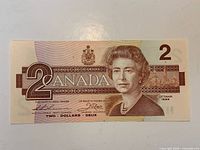 Full obverse view showing denomination, portrait and serial