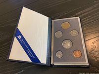 Open presentation case showing six proof coins