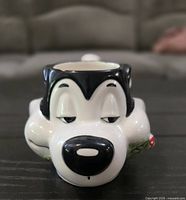 Front view of Pepe Le Pew sculpted mug