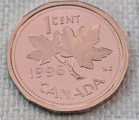 Reverse of 1996 Canadian 1 cent coin, maple leaves design