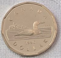 Reverse side showing loon, date and CANADA DOLLAR legend