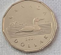 Reverse side showing loon, date 2001, denomination and 11-sided shape
