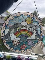 Front view of stained glass hanger in window