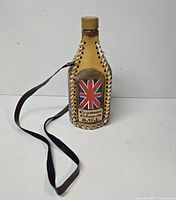 Front view showing Union Jack crest and Cayman Islands B.W.I. text