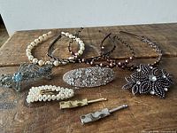 Group of headbands and barrettes arranged on wooden surface