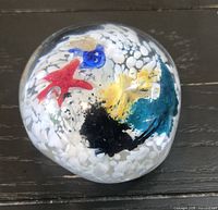 Overall view showing multicolor inclusions and polished surface