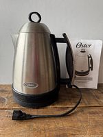 Oster stainless steel electric kettle front view
