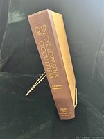 Spine view showing title, author, publisher and two-tone binding