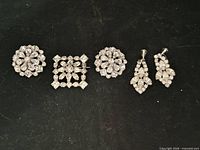 Front view of all five rhinestone jewellery pieces