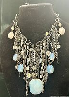 Full view of Chico's necklace on display bust