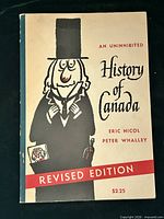 Front cover of book showing title, authors, revised edition note and price