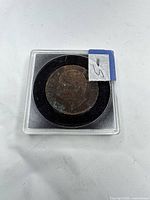 Obverse of 1944 Italian 10 Centesimi coin in holder