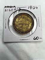 Coin in 2x2 flip front view