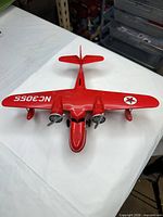 Top view showing Texaco logos, registration NC3055, twin engines