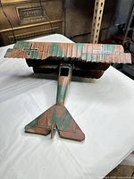 Top rear view showing triple wings, tail, camo paint and Iron Cross decals