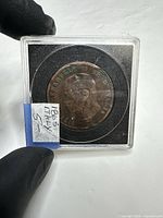 Obverse of 1863 Italian 10 Centesimi coin in holder