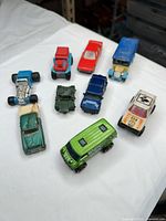 Top view of all ten vehicles arranged on table