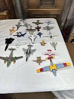 Group shot showing 19 die-cast airplanes of various sizes