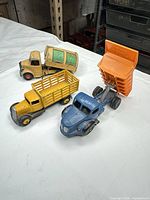Overall view of three toy trucks