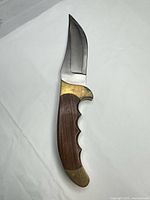 Full knife showing blade and handle