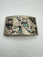 Front view showing abalone inlay and engraving