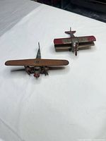 Front angle showing both cast metal airplanes