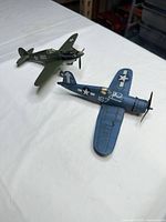 Top view of both diecast airplanes on table