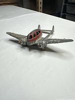 Oblique nose view showing overall shape, cockpit, engines, wing condition