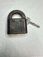 Front view of Yale padlock with keys attached