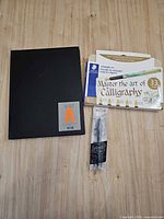 All three packaged items laid out on wood surface