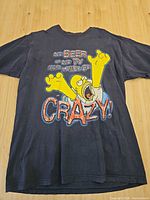 Full view of front graphic and overall shirt condition