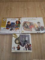 Front view of all three sealed Harry Potter items