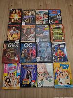 Group shot of all 16 DVD cases laid out in a 4×4 grid